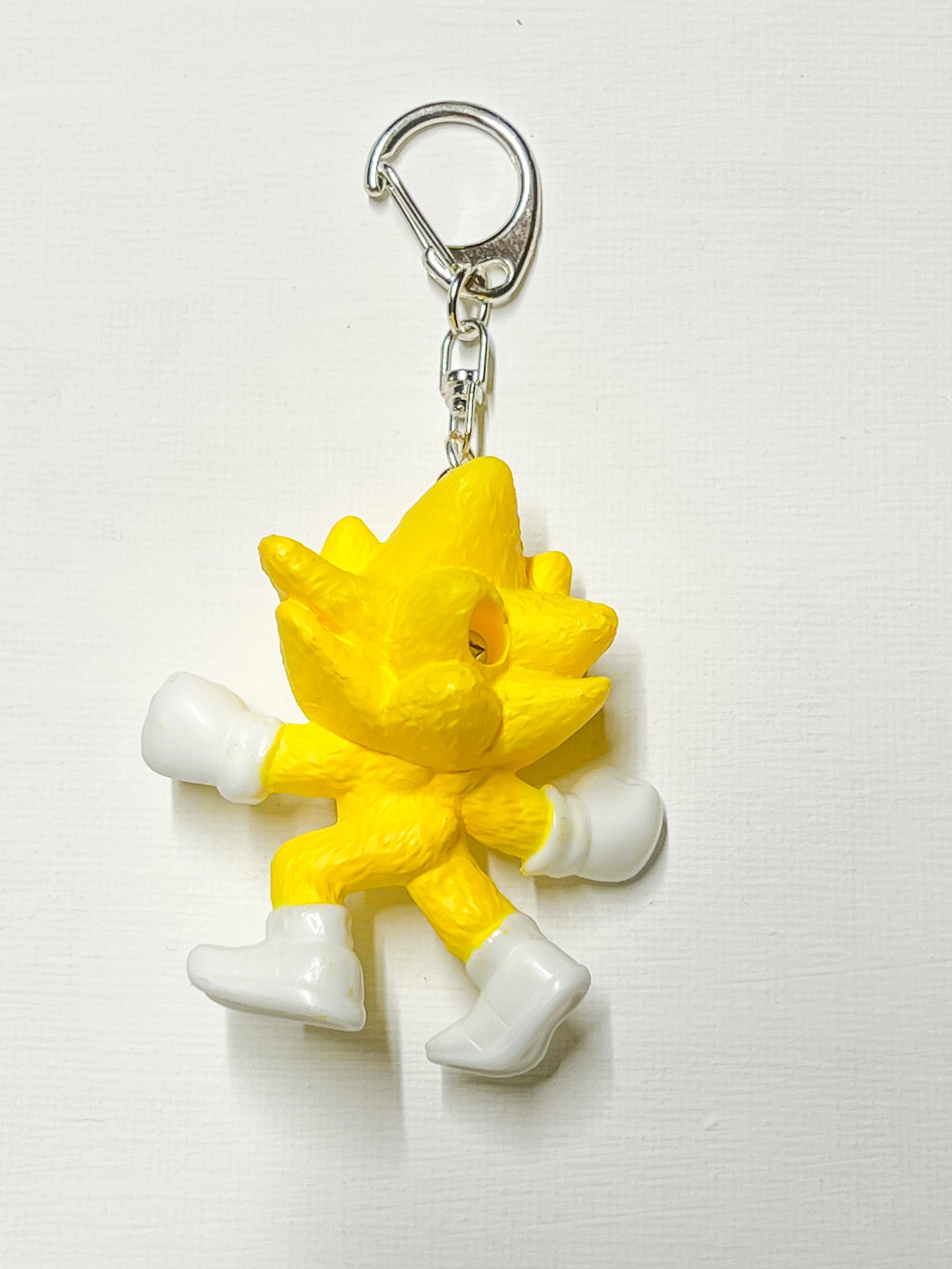 Upcycled Yellow Action Hero Key Chain – Bold, Fun & Full of Energy